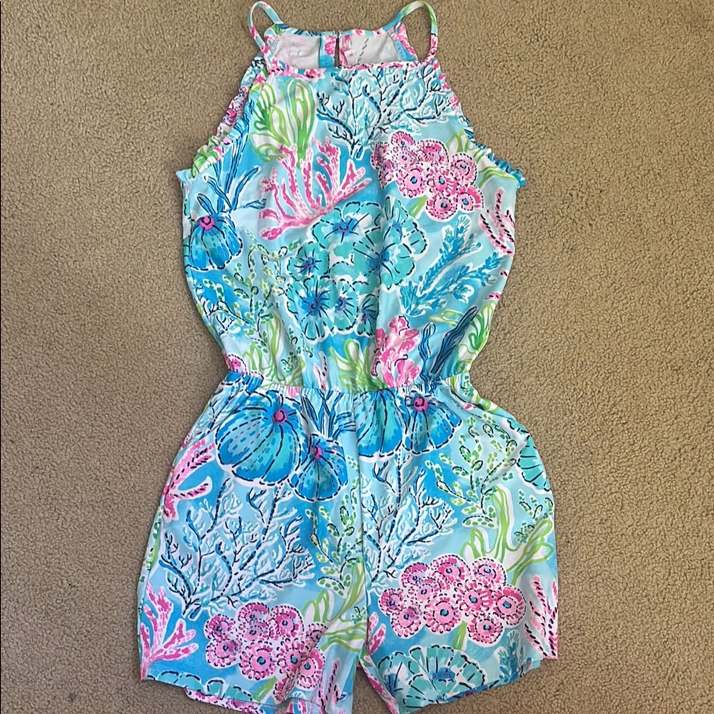 Aryeh Woman’s Floral Romper in Blue and Pink
